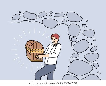 Smiling businessman with chest in hands excited with finding treasure. Happy man with wooden case or box overjoyed with treasury. Vector illustration. 