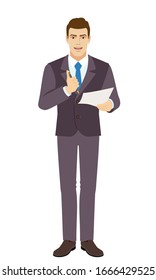 Smiling Businessman holding a pen and paper, pushing a button of a ballpoint pen and wants to write on paper. Full length portrait of Businessman in a flat style. Vector illustration.