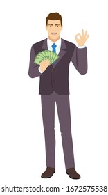 Smiling Businessman with money and show a okay hand sign. Full length portrait of Businessman in a flat style. Vector illustration.
