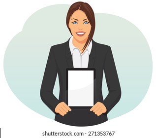 Smiling businesswoman in suit showing blank tablet pc in her hands