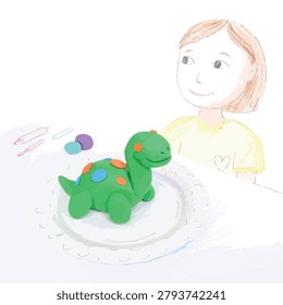A smiling child making a small green clay dinosaur with orange and blue spots on a table