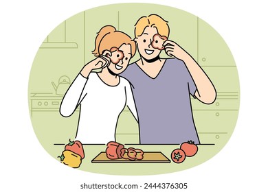 Smiling couple cutting vegetables at home kitchen preparing food together. Happy man and woman cooking on weekend. Cuisine and meal preparation. Vector illustration.