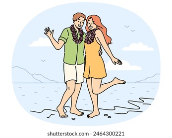 Smiling couple in flower wreaths on neck posing on beach on honeymoon. Happy man and woman enjoy summer vacation on seashore. Vector illustration.