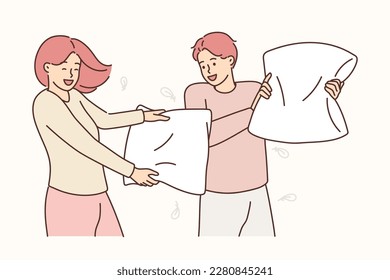 Smiling couple have fun beating with pillow. Happy man and woman engaged in pillow fight. Vector illustration. 