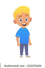 Smiling cute boy blond in blue shirt on white background isolated