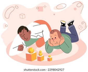 Smiling dad playing cubes with his son on floor, loving father and kid spending time together at home. Fatherhood parenting, family and childhood concept. Man playing puzzle game toy cubes with boy