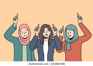 Smiling diverse Arabic women in hijabs showing up at good deal or offer. Happy multiracial females point at sale or promotion. Vector illustration. 