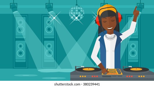 Smiling DJ with console.