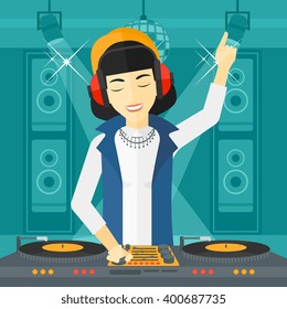 Smiling DJ with console.