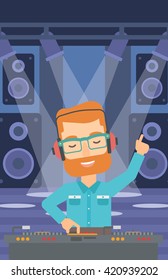 Smiling DJ with console.