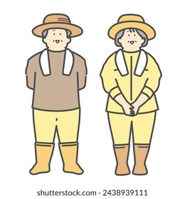 Smiling elderly couple working at a farm