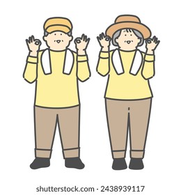Smiling elderly couple working at a farm OK pose