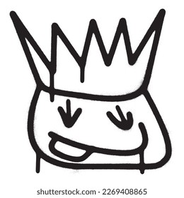 Smiling face emoticon wearing crown with black spray paint