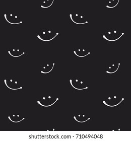 Smiling faces seamless pattern. Doodle style simple emoticons. Decorative vector background for print, textile, web, or any  use.