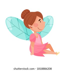 Smiling Fairy or Pixie with Wings Sitting on Ground Vector Illustration