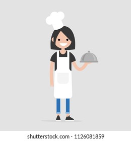 Smiling female chef holding a metal cloche. Serving food. Restaurant. Flat editable vector illustration, clip art