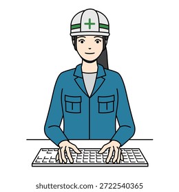 Smiling female engineer with helmet working on computer