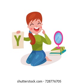 Smiling female speech therapist sitting on the floor showing letter Y, teacher working with children at kindergarten colorful cartoon vector Illustration