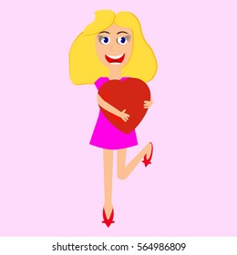 Smiling girl holding a heart at the pink background