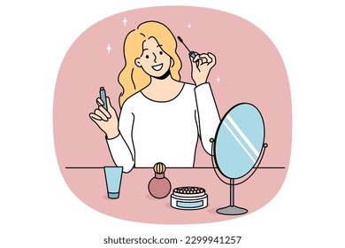 Smiling girl sit at table doing makeup put mascara. Happy young woman look in mirror apply beauty cosmetics products. Daily routine and preparation. Cosmetology. Vector illustration.