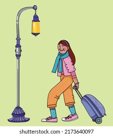 smiling girl travels with her suitcase around the city