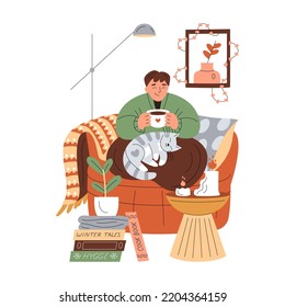 Smiling girl in warm clothes rests in armchair, holds a cup of warm drink. Cute grey cat. Lights, table, plant, books and candles. Cosy hygge aesthetics. Female character. Flat hand-drawn vector  