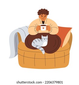 Smiling girl in warm clothes rests in armchair, holds a cup of warm drink. Cute grey cat. Cosy hygge aesthetics. Female character. Flat hand-drawn vector  