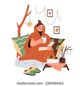 Smiling girl wrapped in a blanket sits in cushions and reads, holding a cup of warm drink. Lights, cookies, warm home shoes. Cosy hygge aesthetics. Female character. Flat hand-drawn vector  