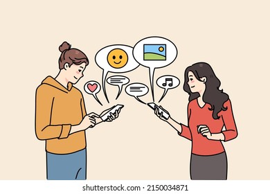 Smiling girlfriends using cellphones communicating online on social media. Happy girls chat text on internet on smartphones, send share messages on devices. Communication. Vector illustration. 