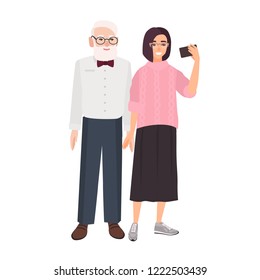 Smiling grandfather and granddaughter standing together and taking selfie. Cute funny elderly man and young girl making photo on smartphone. Colorful vector illustration in flat cartoon style.