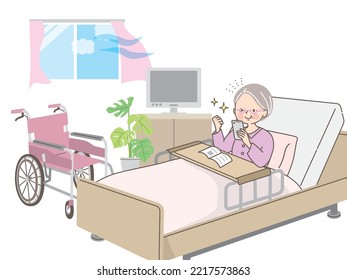 Smiling grandma learning how to use her smartphone while in the hospital