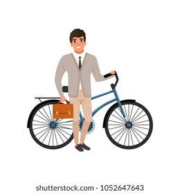 Smiling guy standing with bicycle and briefcase in hand. Cartoon man in stylish clothes: cardigan, shirt, tie and pants. Office worker. Flat vector design