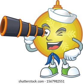 Smiling happy yellow christmas ball as a sailor with binocular.