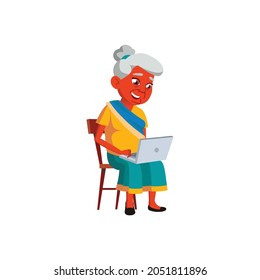 smiling indian woman senior watching photography on notebook cartoon vector. smiling indian woman senior watching photography on notebook character. isolated flat cartoon illustration