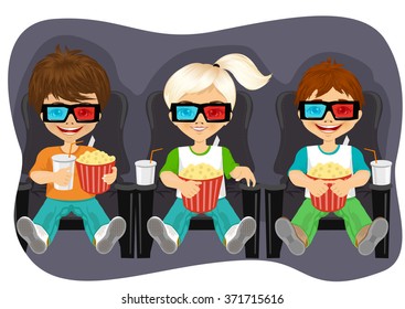 Smiling kids with popcorn watching 3D movie in cinema theater