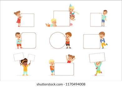 Smiling kids standing with white blank boards set. Happy little boys and girls in casual clothes holding empty posters vector illustrations