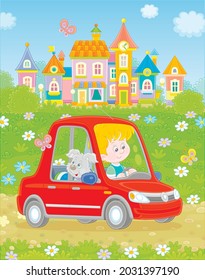 Smiling little boy with his pup driving a toy car on a road out of a pretty small town on a summer day, vector cartoon illustration