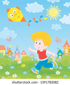 Smiling little boy running and playing with a funny toy kite against a background of colorful houses of a small town on a sunny summer day, vector illustration in a cartoon style