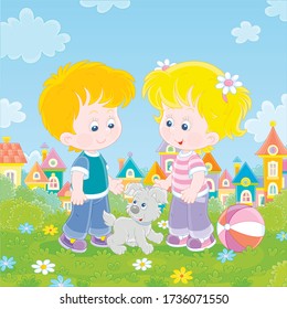 Smiling little children talking and walking together with a cheerful grey puppy in a green town park on a sunny summer day, vector cartoon illustration