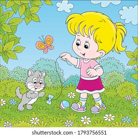 Smiling little girl playing with a small grey kitten among flowers on green grass of a lawn on a sunny summer day, vector cartoon illustration