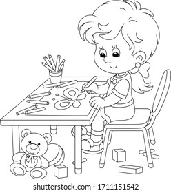 Smiling little girl sitting at her table and drawing with pencils a funny picture of a small beautiful butterfly, black and white vector cartoon illustration