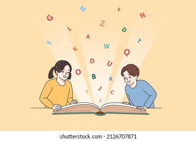 Smiling little kids learners have fun reading book together. Happy small children sit at desk enjoy literature. Booklover study or learn in school or kindergarten. Flat vector illustration. 