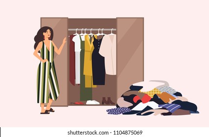 Smiling long-haired girl standing in front of opened closet with apparel hanging inside and pile of clothes on floor. Concept of minimalist capsule wardrobe. Cartoon vector illustration in flat style - Shutterstock ID 1104875069