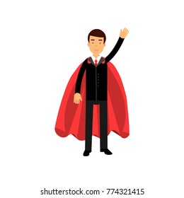 Smiling male character in classic black suit with red superhero mantle. Cartoon business man standing and waving by hand. Flat vector illustration.