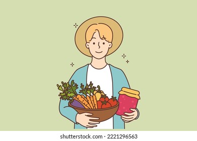 Smiling male farmer with fruits and vegetables in hands. Happy man gardener with crops excited with good harvest. Organic products. Vector illustration. 