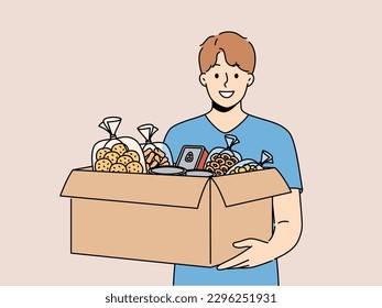 Smiling male volunteer with box of food bring donation at crisis or refugee center. Happy man activist volunteer help homeless or poor people. Vector illustration. 