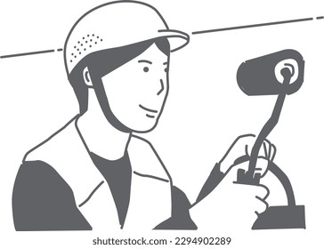 
Smiling male worker with paint roller