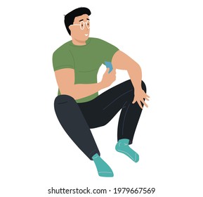 Smiling man with glasses sits on floor. Guy sitting on floor holds card in his hands. Male character holding blue piece of paper and looking at something. Person on chair isolated on white background