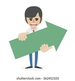 Smiling man holding green arrow