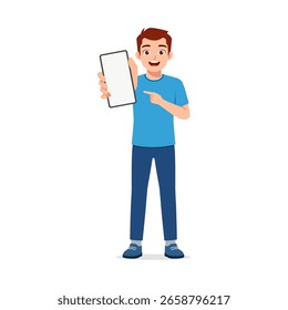 Smiling Man Holding and Pointing to a Blank Smartphone Screen for Advertisement in Full Body